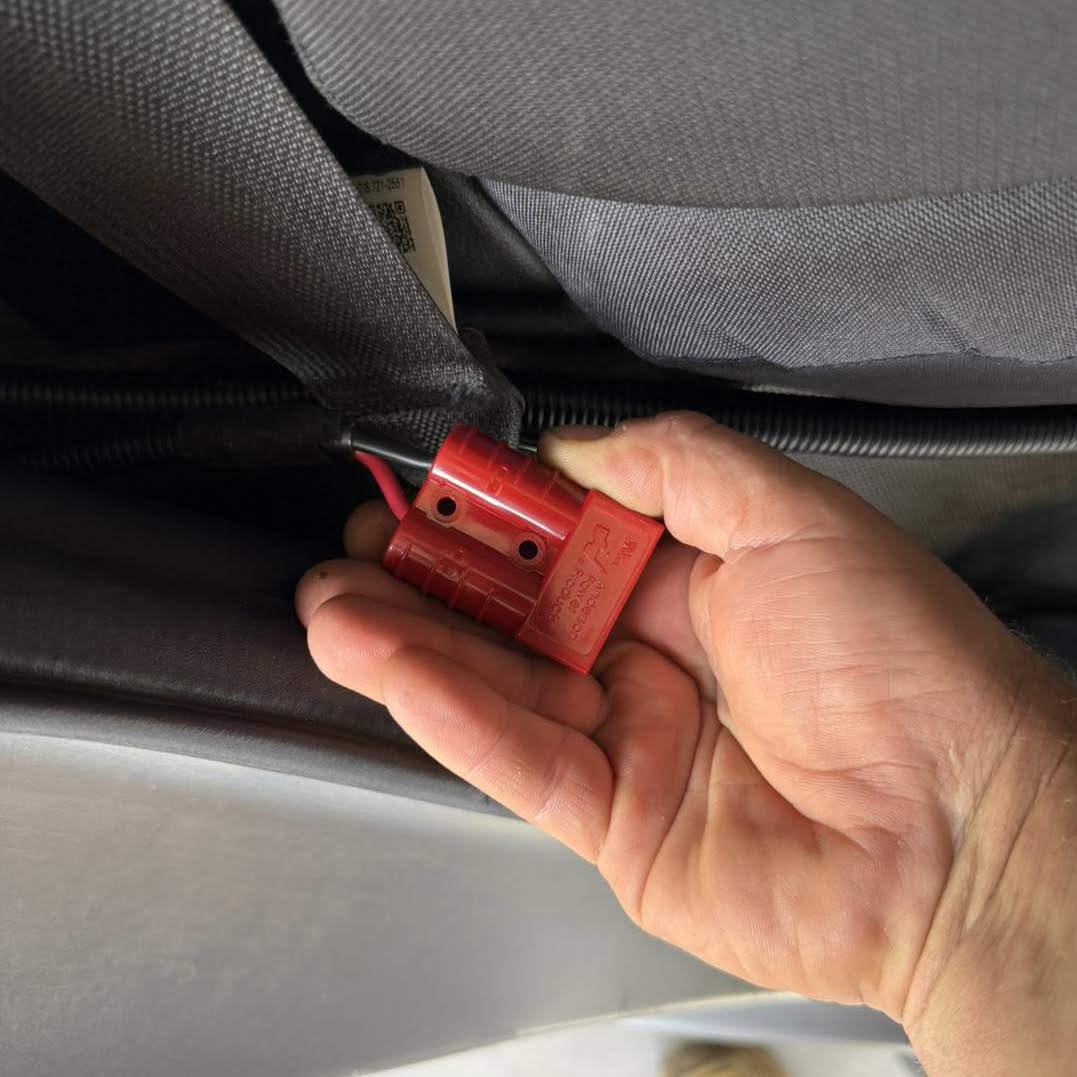 Red Anderson plug being fitted
